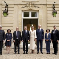 Antony Blinken, Margrethe Vestager and other guests pose for a group photo ahead of a dinner at the U.S.-European Union Trade and Technology Council summit, in Paris May 15, 2022