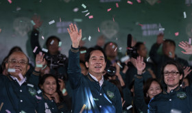 Taiwanese Vice President Lai Ching-te, also known as William Lai, left, celebrates his victory with running mate Bi-khim Hsiao in Taipei, Taiwan, Saturday, Jan. 13, 2024. 