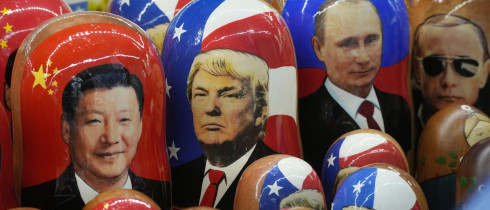 Traditional Russian wooden dolls called Matryoshka depicting China's President Xi Jinping, U.S. President-elect Donald Trump and Russian President Vladimir Putin are displayed for sale at a souvenir shop in St. Petersburg, Russia.